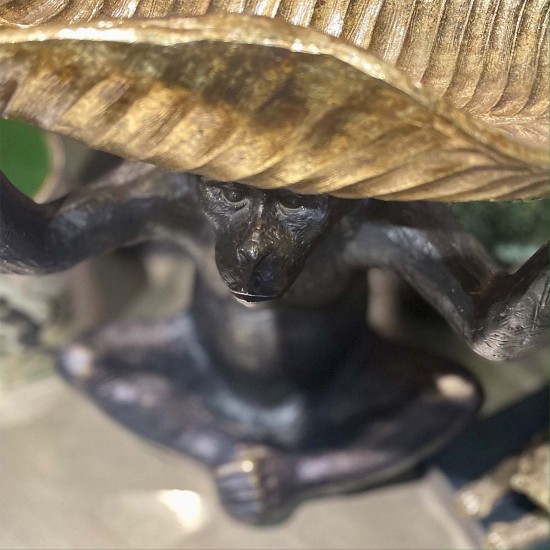 Monkey with Lotus Leaf on Head 